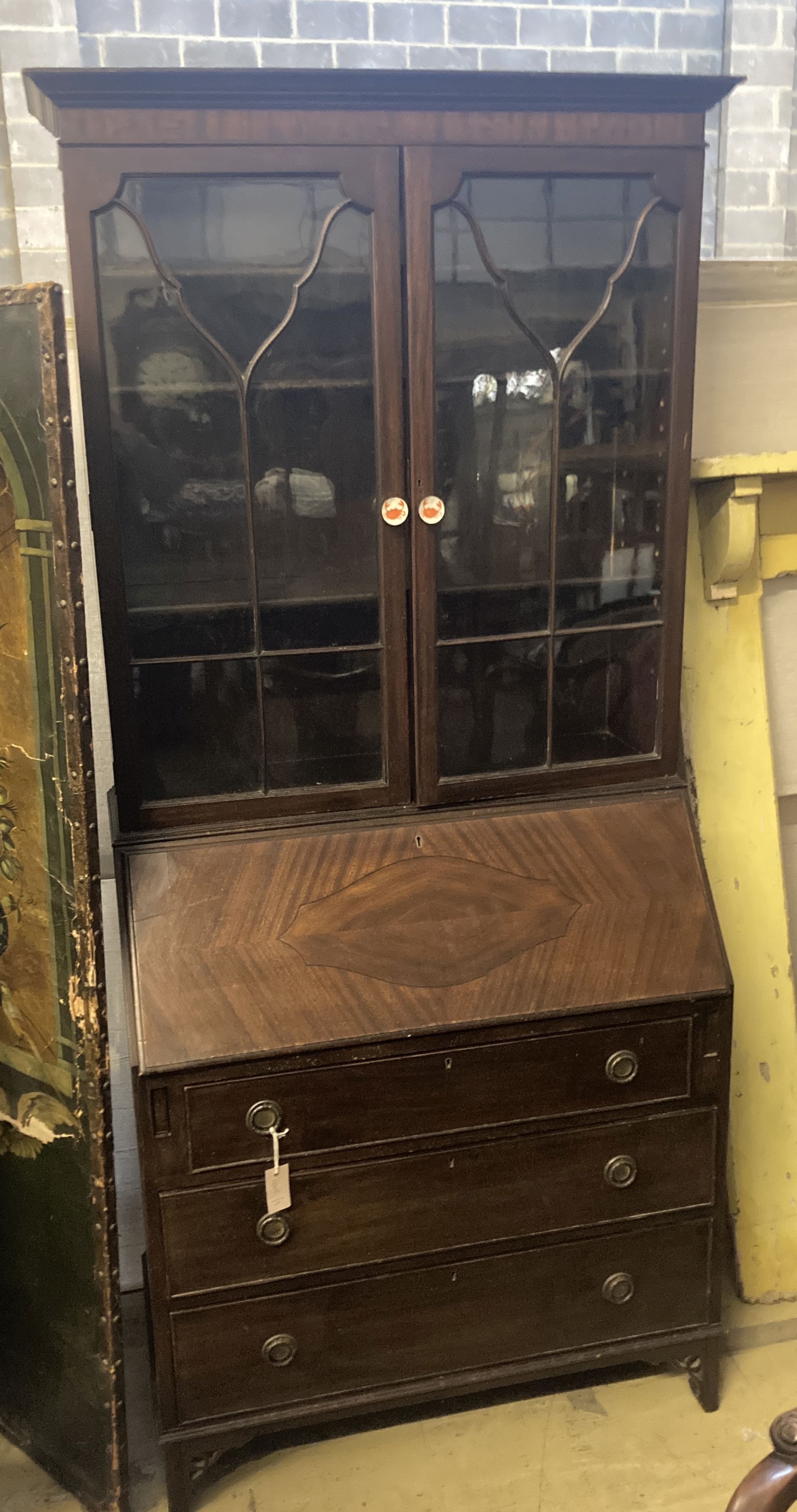 A 1920s mahogany bureau bookcase, width 92cm depth 44cm height 209cm